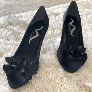 Black satin ruffle heels